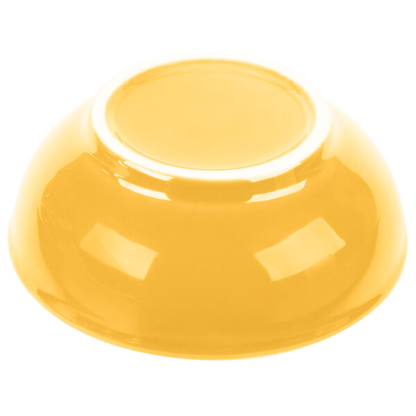 A yellow Libbey Cantina bowl on a white surface.