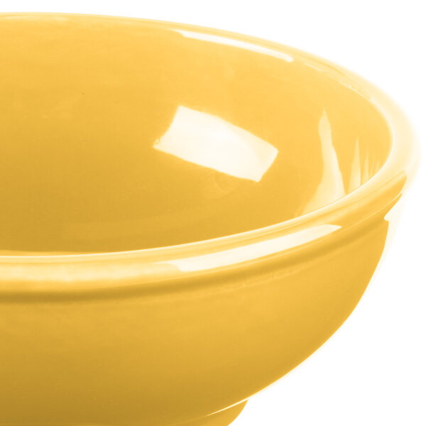 A close up of a yellow Libbey Cantina oatmeal bowl.