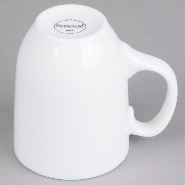 A Libbey white porcelain mug with a handle.