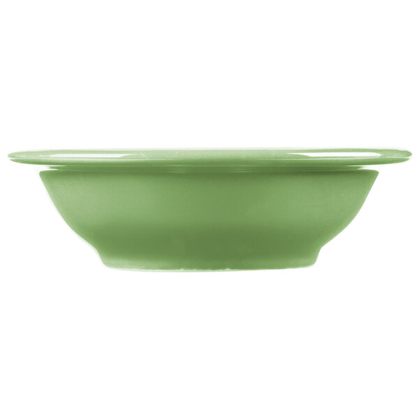 A sage green Libbey porcelain fruit bowl with a white border.