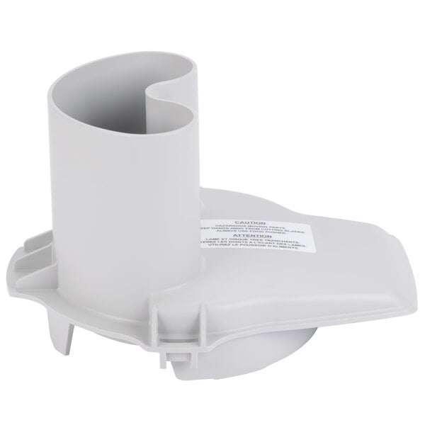 A white plastic cylinder with a hole and a white label that says "Robot Coupe 101861S"