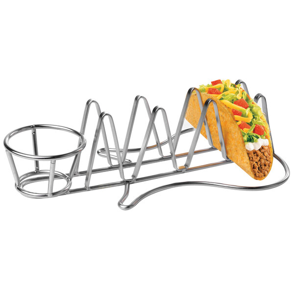 A stainless steel guitar shaped taco holder with tacos in it.