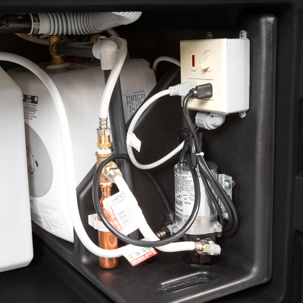 A Cambro CamKiosk portable hand sink with a black base and granite gray door.