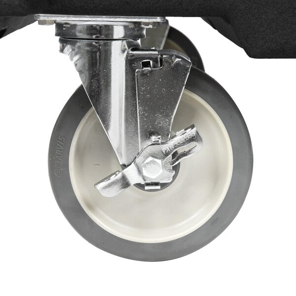 The metal base of a black and gray portable sink with a white wheel.
