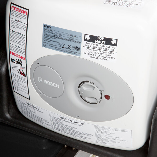 A white rectangular Cambro CamKiosk base with a gray door and a digital display.