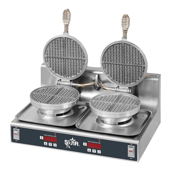 A Star double waffle maker with round plates on top.