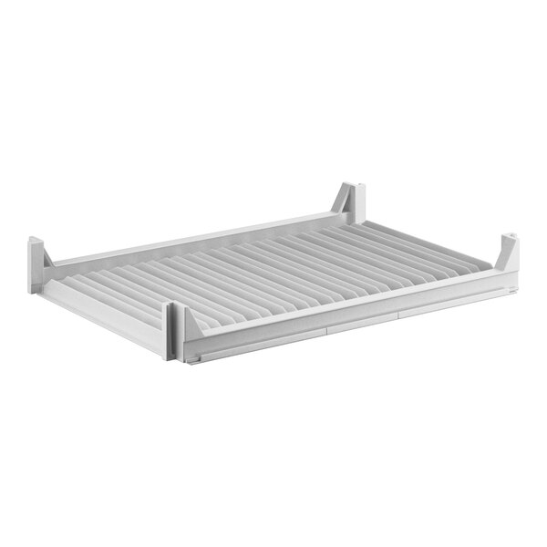 A white metal slatted shelf from Cambro.