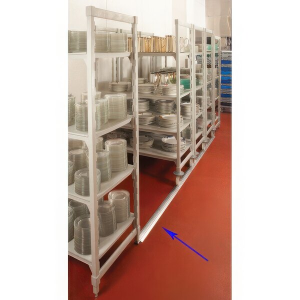 A white Cambro Camshelving® track kit with plates stacked on it.