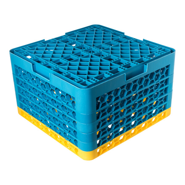 A blue and yellow plastic glass rack with 16 compartments and 5 extenders.