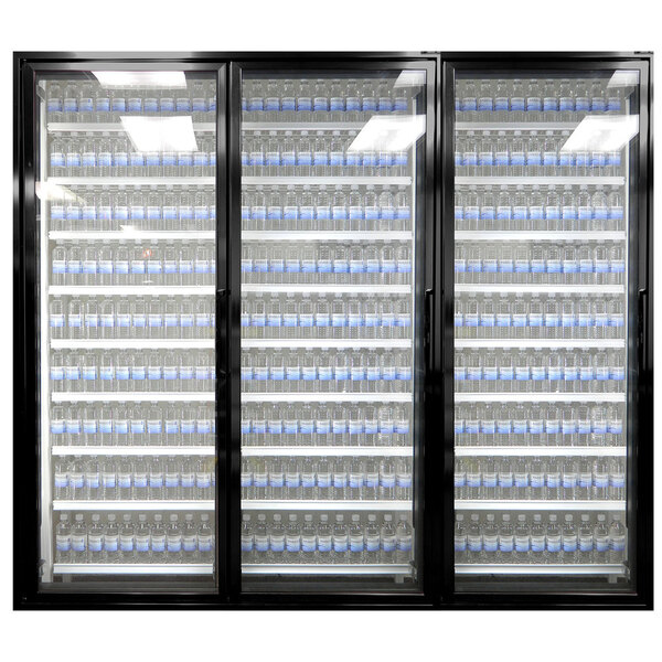 Styleline walk-in cooler merchandiser doors with shelving filled with water bottles.