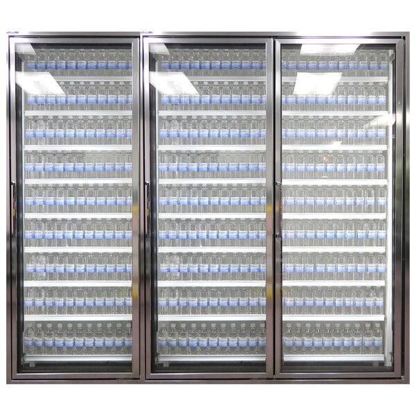 Styleline walk-in cooler doors with shelving holding water bottles.