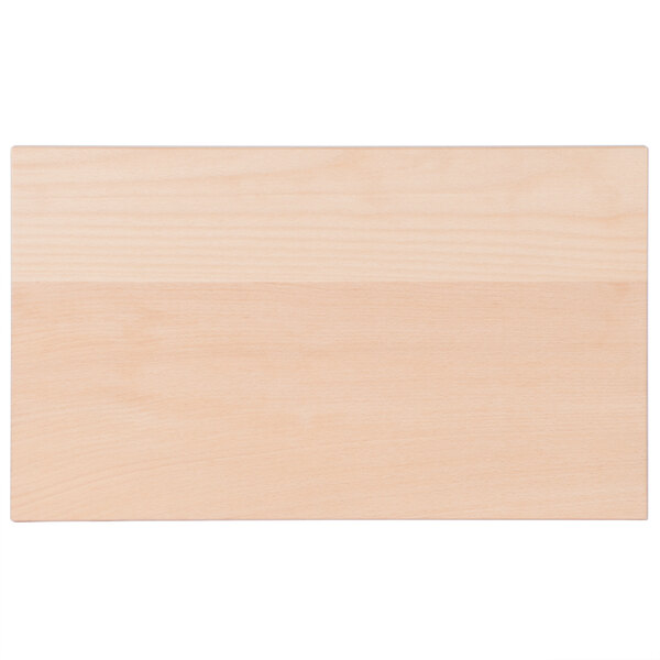 A close-up of a wood surface on a Vollrath hardwood display cutting board.