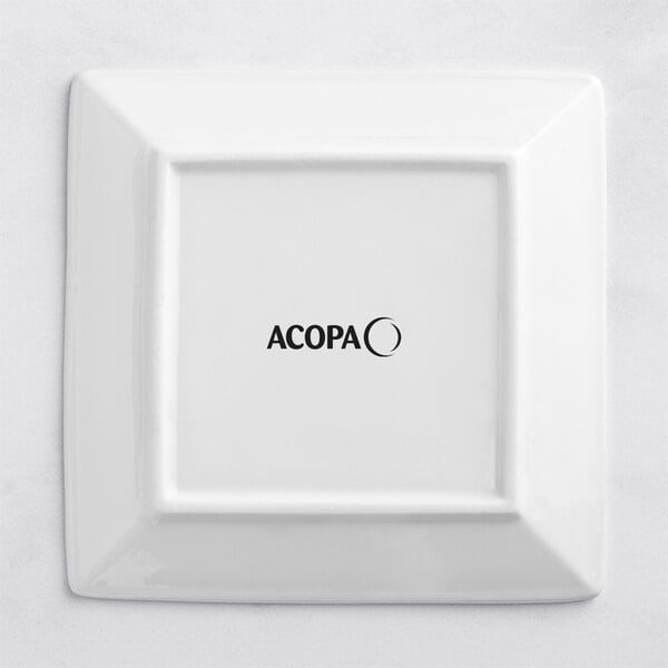 An Acopa bright white square porcelain plate with black text that says "Acopa"