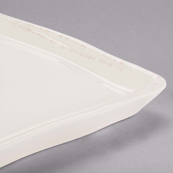 An ivory rectangular porcelain tray with a small rim.
