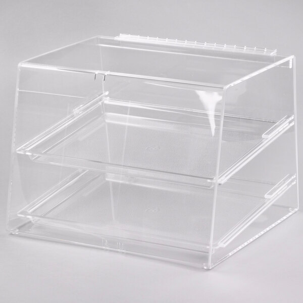 A clear plastic Cal-Mil bakery display case with two shelves.