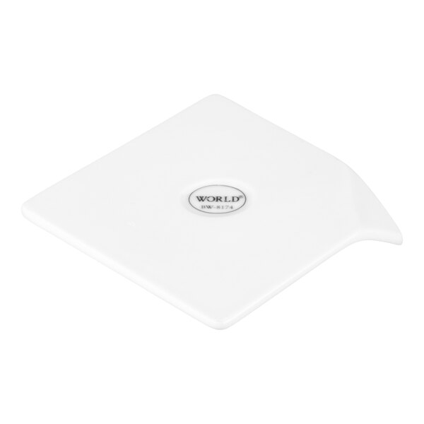 A small, white, square porcelain plate with a handle, designed for serving, shown with a 'World' logo in the center.