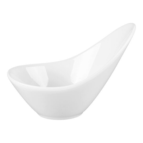 A white porcelain bowl with a modern, asymmetrical design and a raised edge.