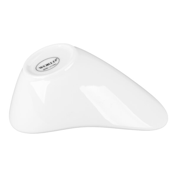 A white porcelain Riviera bowl with a modern, asymmetrical design.