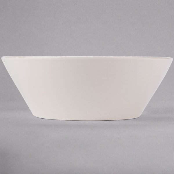 A white Libbey porcelain serving bowl.