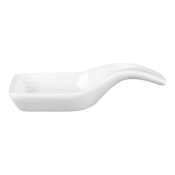 A white porcelain spoon with a curved handle and a rectangular bowl.