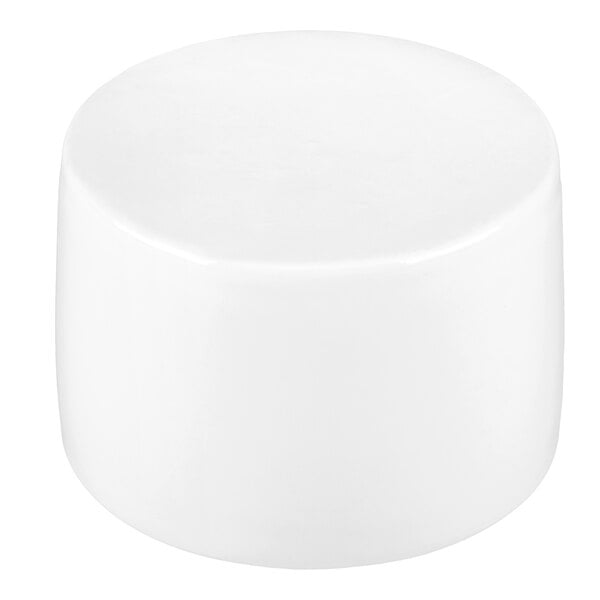 A small, round, ultra bright white porcelain bowl with smooth sides.