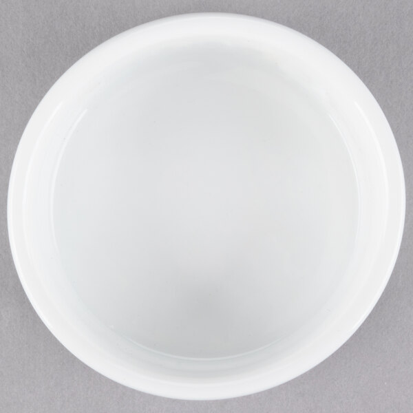 A Libbey ultra bright white porcelain monorail bowl on a gray surface.