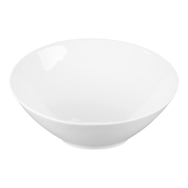 A large, plain white porcelain bowl with a smooth, rounded shape.