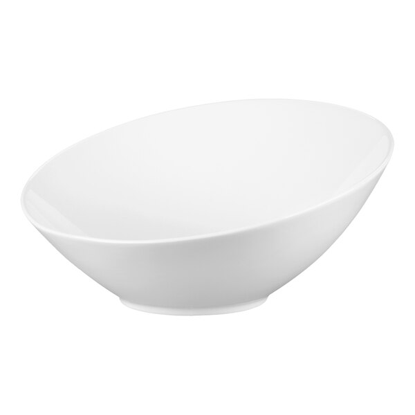 A large, white porcelain bowl with a modern, angled design.