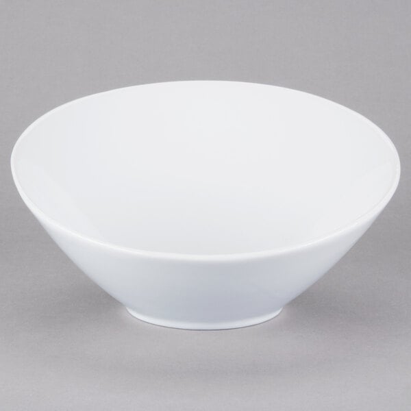 A Libbey Ultra Bright White porcelain bowl with a small rim.