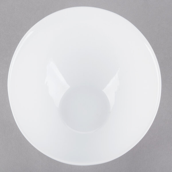 A white Libbey porcelain bowl with a circle in the middle.