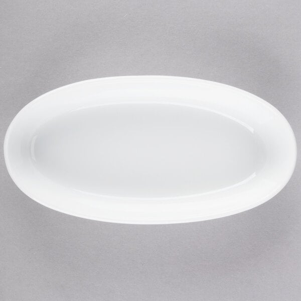 A white Libbey porcelain oval bowl.