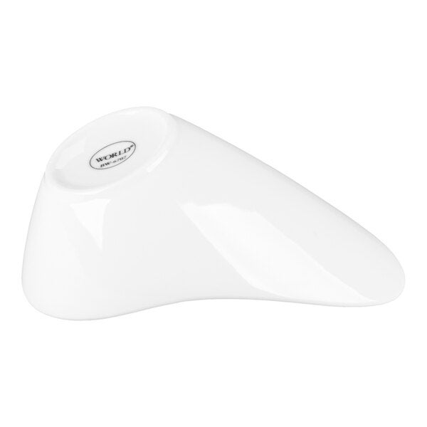 A white porcelain Riviera bowl with a modern, asymmetrical design.