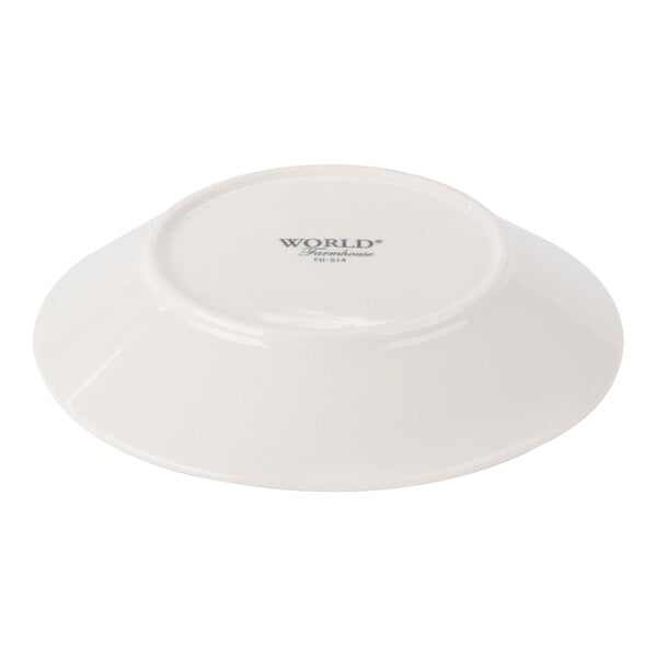 A round cream porcelain soup and salad bowl shown upside down.