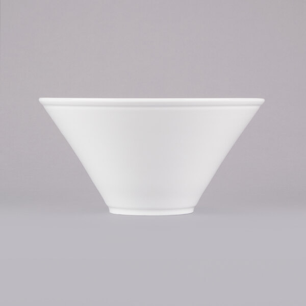 A Libbey ultra bright white porcelain Normandy bowl on a white surface.