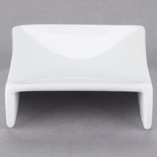 A Libbey Chef's Selection II white porcelain rectangular plate with curved edges.