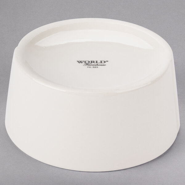 A Libbey round ivory porcelain oatmeal bowl with black text on a white background.