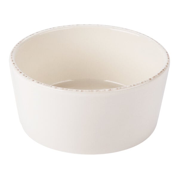 A round cream-colored porcelain oatmeal bowl with a 15 oz. capacity.