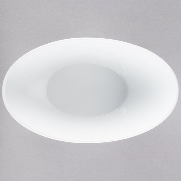 A white Libbey Neptune bowl with a small hole in the middle.