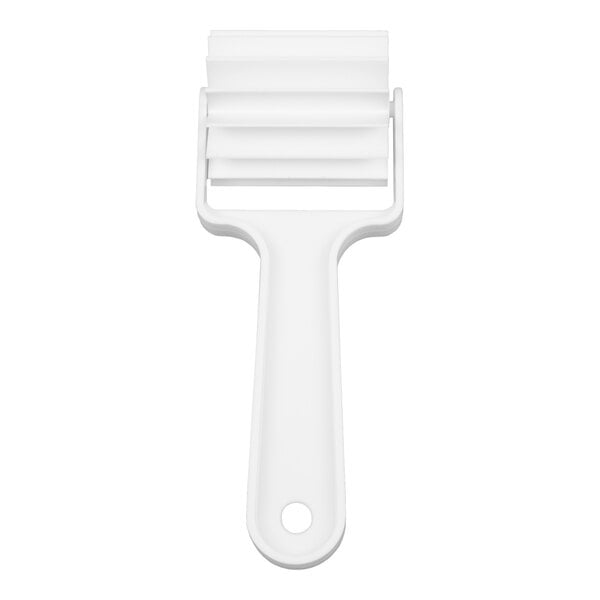 A white plastic tool with a handle and a head featuring three parallel, evenly spaced blades.