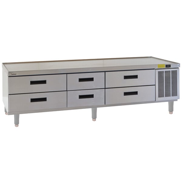 A stainless steel Delfield chef base with six drawers.