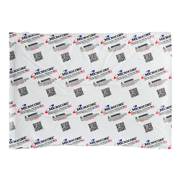 A rectangular Vesture Microcore 10" x 14" heavy-duty thermal hot or cold pack with branded and warning text on the surface.