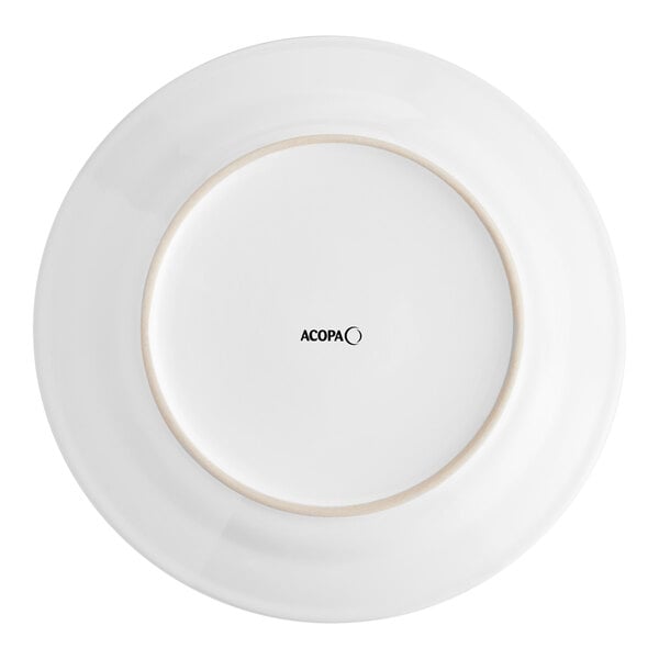 An Acopa bright white stoneware plate with a wide rolled edge.