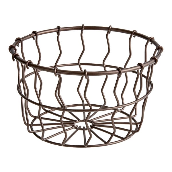 An American Metalcraft bronze wire basket with a handle and circular bottom.