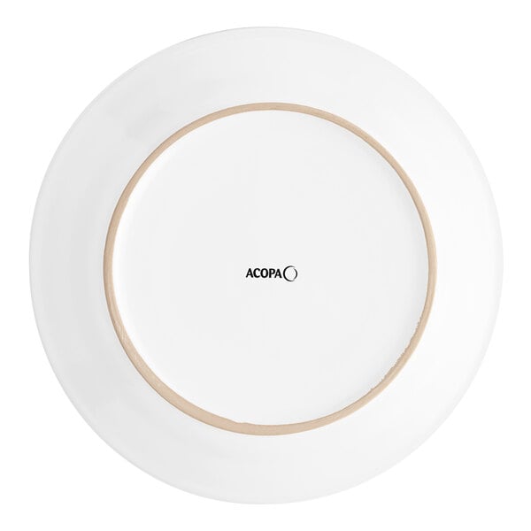 An Acopa bright white stoneware plate with a brown rim.