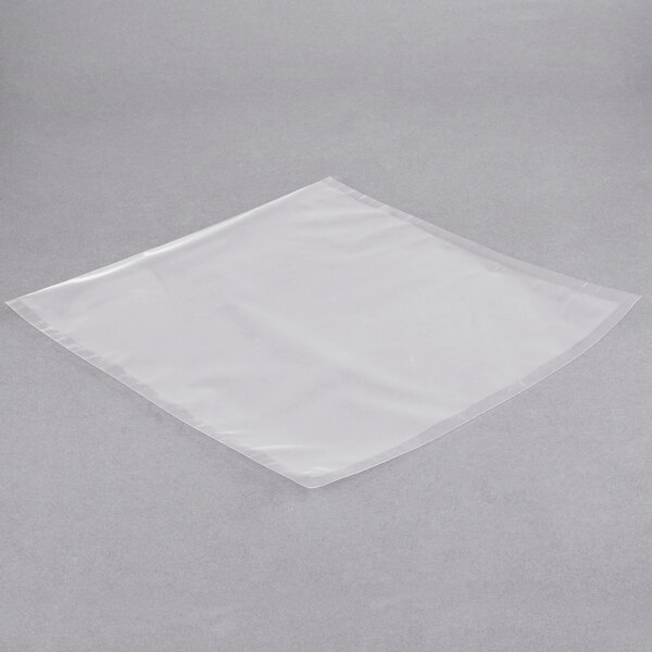 A case of ARY VacMaster chamber vacuum packaging bags on a gray surface.