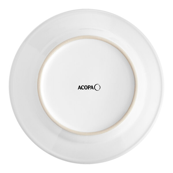 An Acopa bright white stoneware plate with a rolled edge and black text on the rim.