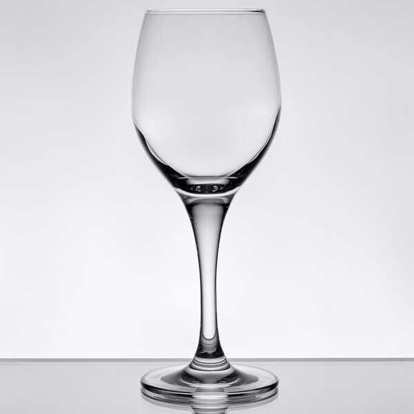 A close-up of a clear Stolzle Nadine dessert wine glass.