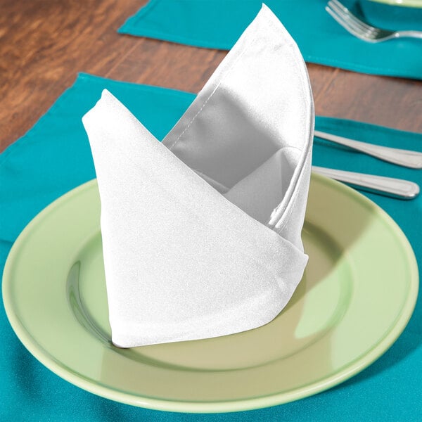 a folded napkin on a plate