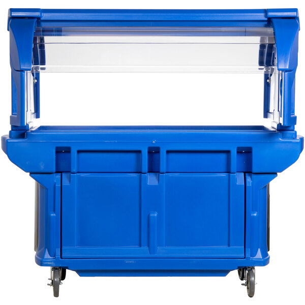 A blue Cambro food cart with clear lids on a counter.