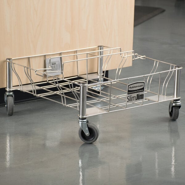 A Rubbermaid stainless steel dolly with wheels.